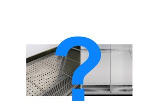 Biosafety cabinet work surface: solid or perforated?